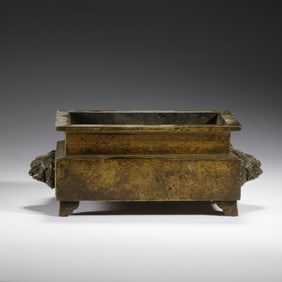A BRONZE-GILT INCENSE BURNER