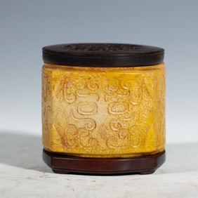 A CHINESE ARCHAISTIC CARVED JADE CONG