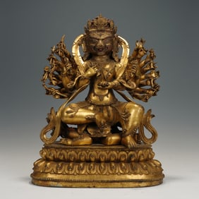 A BRONZE-GILT VAJRAVARAHI