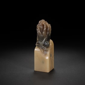 A CARVED SHOUSHAN STONE SEAL