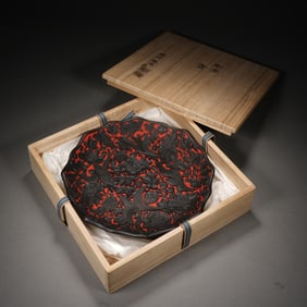 A CARVED CINNABAR LACQUER LOBED DISH