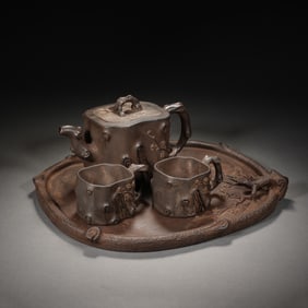 A SET OF YIXING GLAZE ZISHA TABLE-WARES