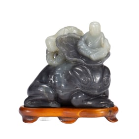 A CARVED JADE BOYS WITH GOLDEN FROG
