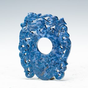 A FINE AND RARE CARVED LAPIS ORNAMENT SHE