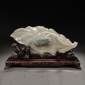 A CARVED WHITE JADE CICADA