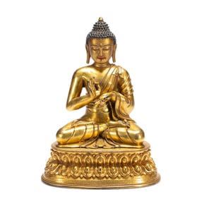 A TIBETAN BRONZE-GILT FIGURE OF DIPAMKARA