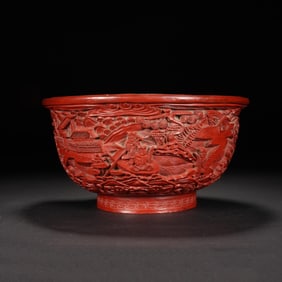 A CARVED CINNABAR LACQUER BOWL