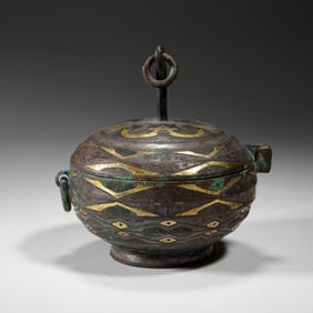 A GOLD AND SILVER INLAID BRONZE VESSEL WITH COVER