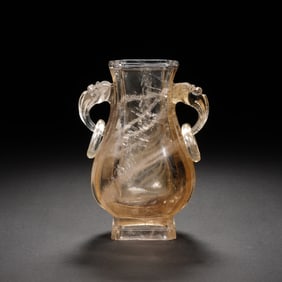 A CARVED ROCK CRYSTAL VASE WITH HANDLES