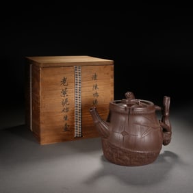 A YIXING GLAZE ZISHA TEAPOT