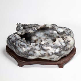 A CARVED JADE DRAGON WASHER