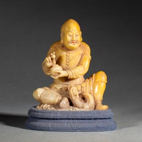A CARVED SHOUSHAN STONE LUOHAN
