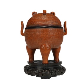 A CARVED BAMBOO INCENSE BURNER WITH COVER