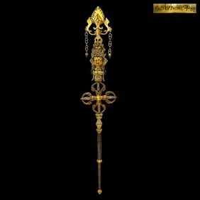 A SINO-TIBETAN BRONZE GILT KHATVANGA