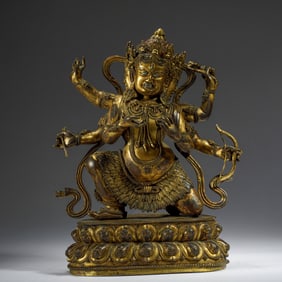 A SINO-TIBETAN BRONZE-GILT MAHAKALA