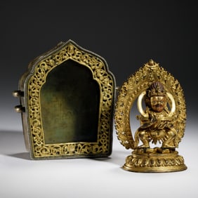 A RARE BRONZE-GILT FIGURE OF MAHAKALA