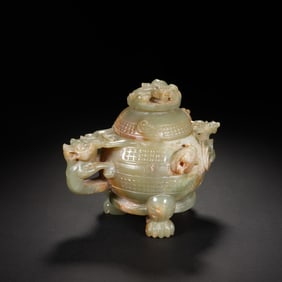 A FINE CARVED YELLOW JADE VESSEL WITH COVER