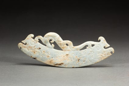 A CARVED JADE ORNAMENT