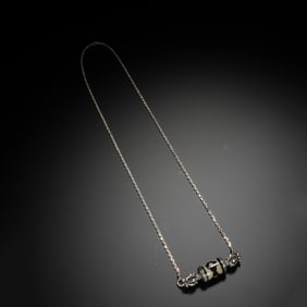 A TIBETAN DZI BEAD NECKLACE