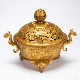 A BRONZE-GILT INCENSE BURNER