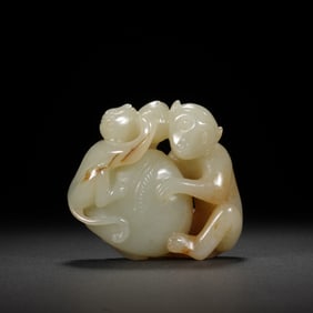 A CARVED WHITE JADE MONKEYS WITH PEACH
