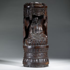 A CARVED HUANGHUALI GUANYIN