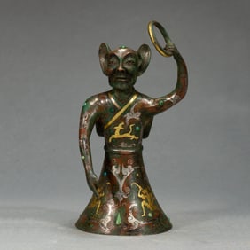 AN IMPORTANT GOLD AND SILVER INLAID BRONZE KNEELING FIGURE