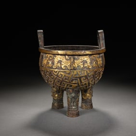 A BRONZE PARTLY GILT VESSEL DING