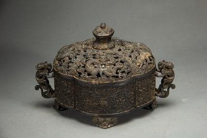 A BRONZE DRAGON INCENSE BURNER WITH COVER