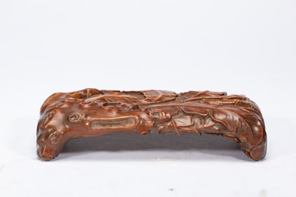 A CARVED HUANGHUALI ARM-REST