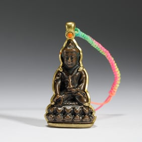 A BRONZE BUDDHA PENDNAT