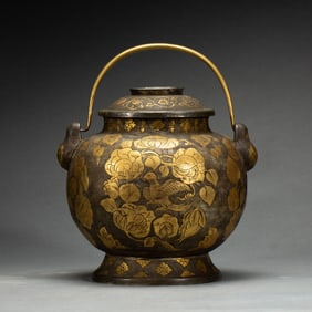 A BRONZE PARTLY GILT VESSEL WITH COVER