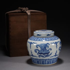 A BLUE AND WHITE JAR WITH COVER