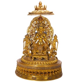 AN EXTREMELY RARE BRONZE-GILT MAITREYA