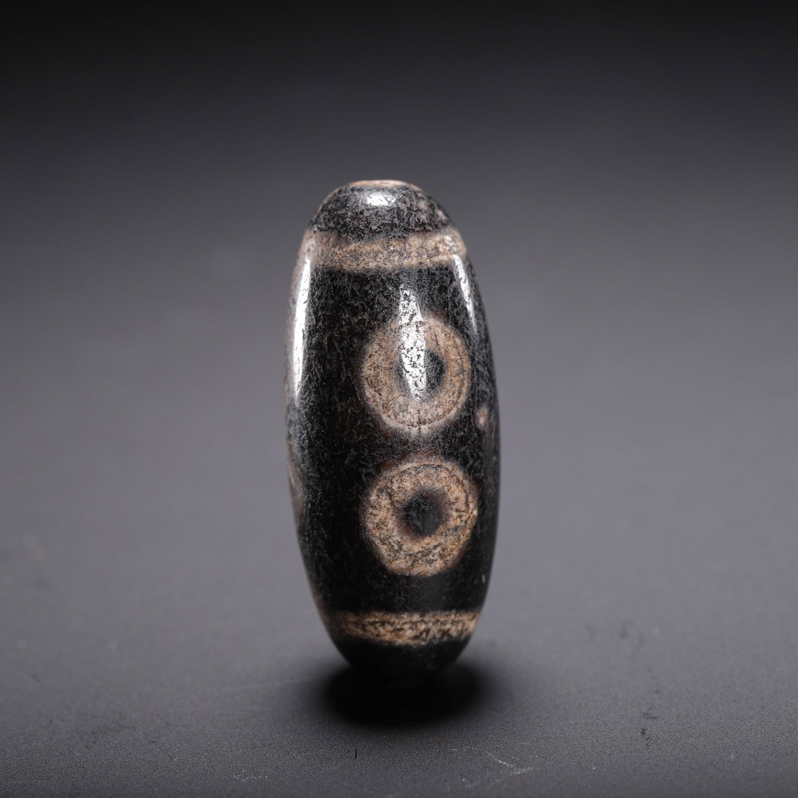 A TIBETAN DZI BEAD (1 of 9)