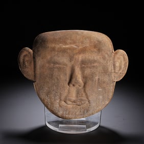 A SILVER-GILT FIGURAL MASK