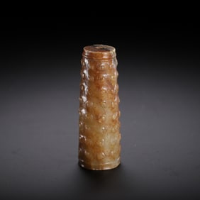 A CARVED JADE PENDANT