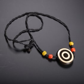 A TIBETAN DZI BEAD NECKLACE