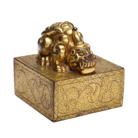 A TIBETAN BRONZE-GILT BEAST SEAL