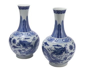 PAIR OF BLUE AND WHITE DRAGON DECORATIVE VASES