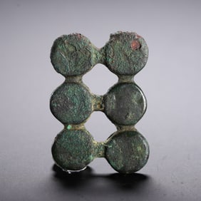 A TIBETAN AMULET ORNAMENT