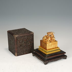 A BRONZE-GILT DRAGON SEAL