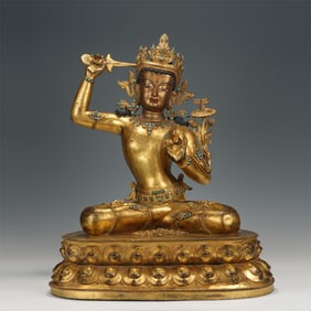 A SINO-TIBETAN BRONZE GILT MANJUSRI