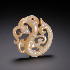 A WHITE JADE CARVING OF CHILONG