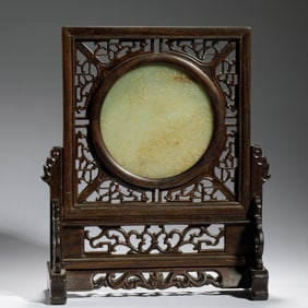 A CARVED WHITE JADE PLAQUE INLAID WOODEN TABLE SCREEN