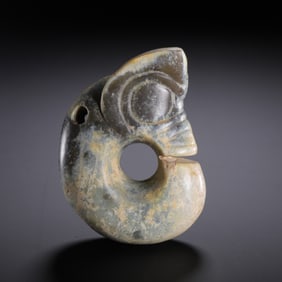 A CARVED JADE PIG-DRAGON