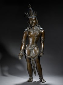 A BRONZE STANDING PADMAPANI