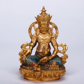 A CLOISONNE ENAMEL FIGURE OF JAMBHALA