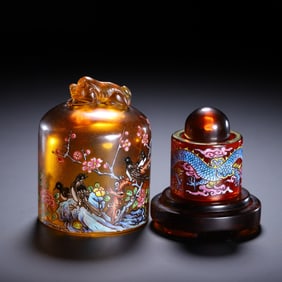 A POLYCHROME PAINTED PEKING GLASS ARCHER RING WITH BOX