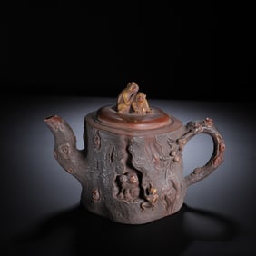 A YIXING GLAZE ZISHA TEAPOT